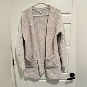 Kikit cardigan* offers welcome